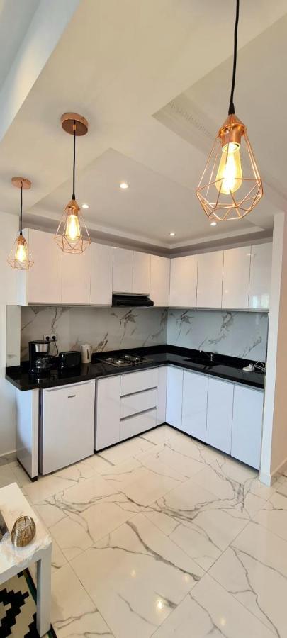 Luxueux Appartement Downtown Rabat Esterno foto