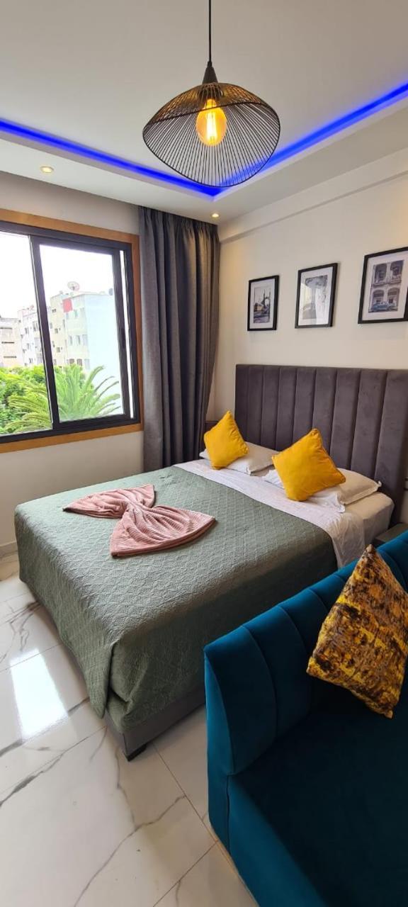 Luxueux Appartement Downtown Rabat Esterno foto